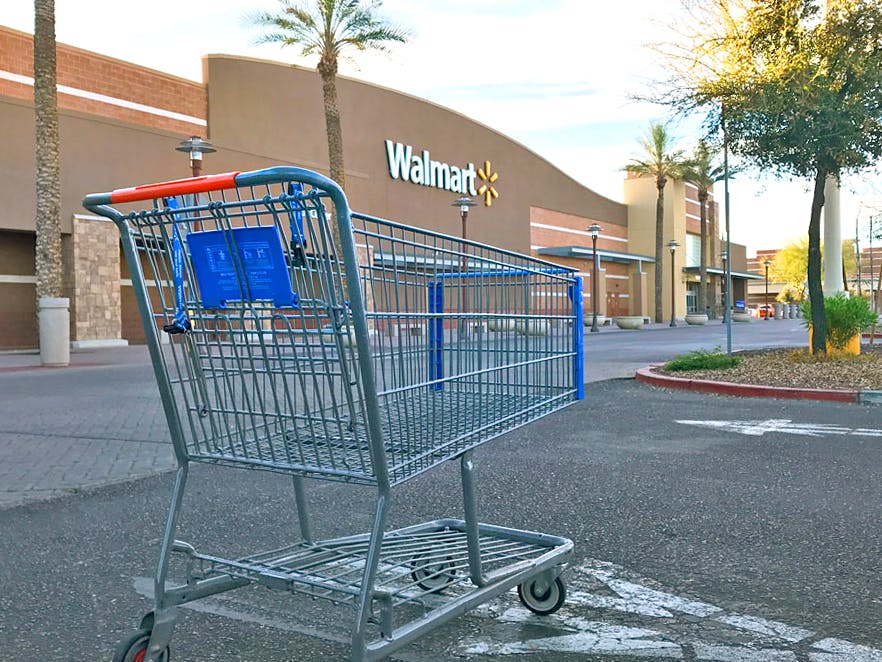 lone walmart cart in parking lot