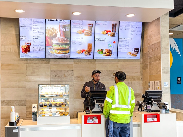 a person ordering at mcdonalds 