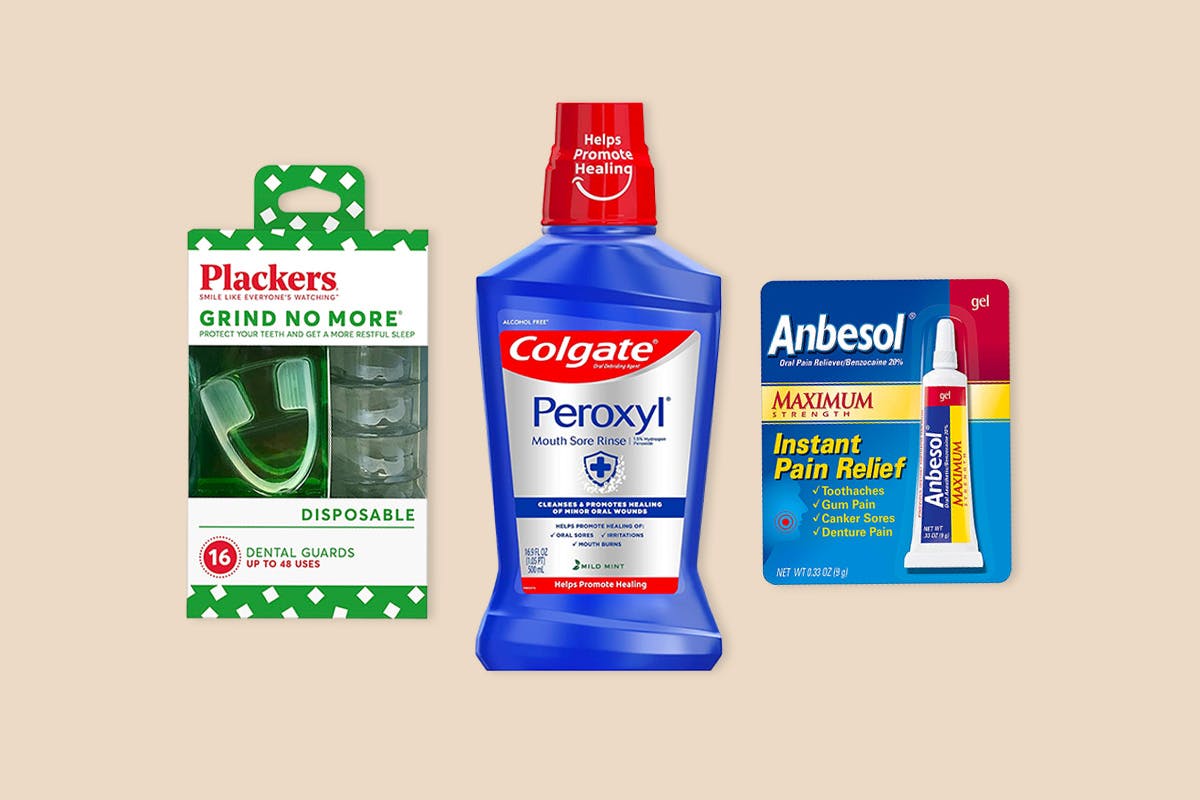 Some oral care products on a neutral background