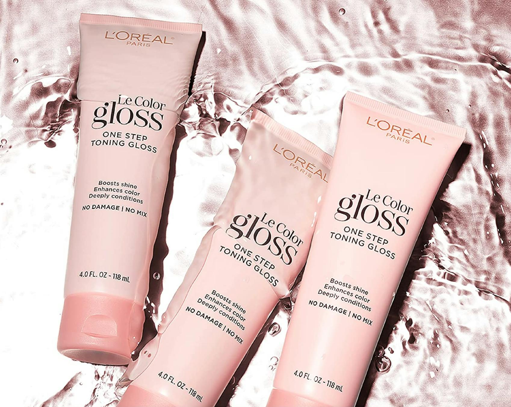 three bottles of l'oreal le gloss hair toner in water