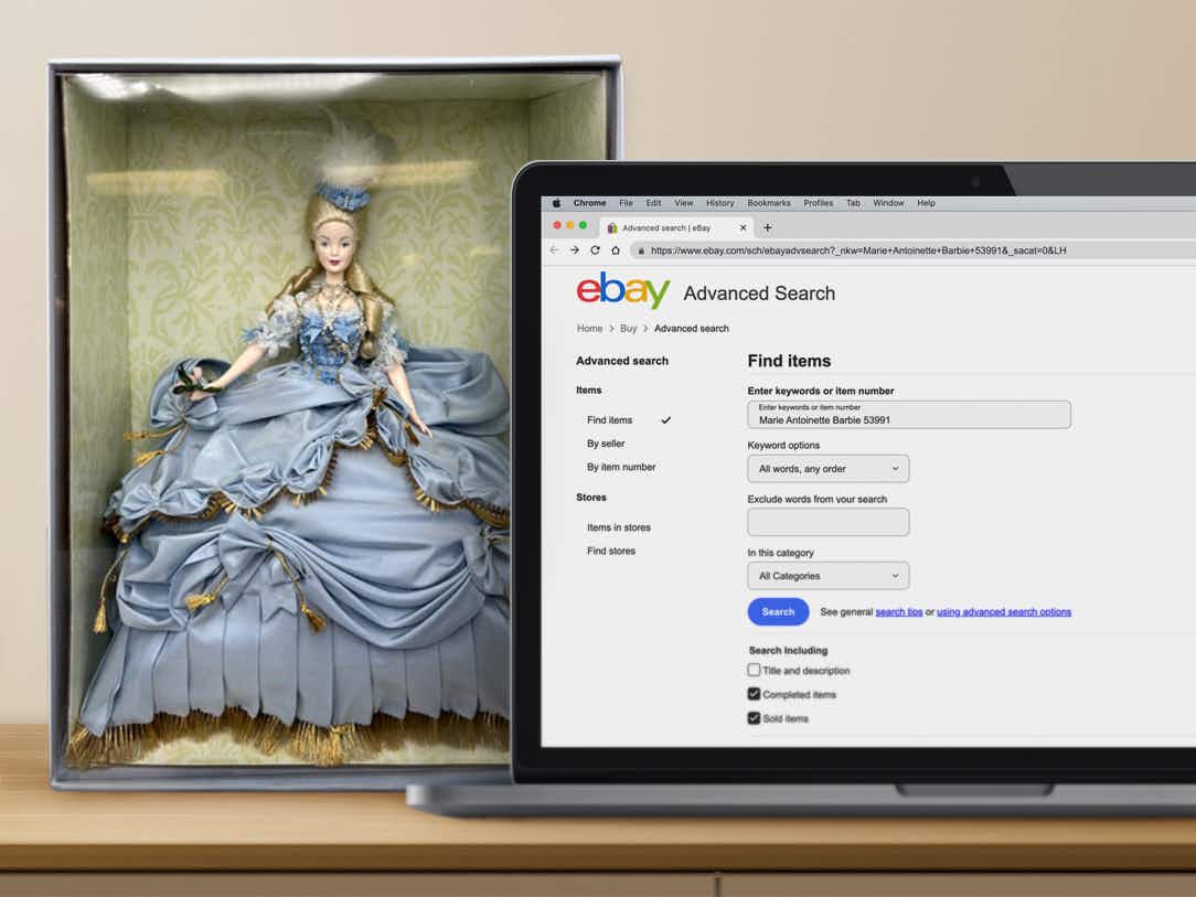 boxed marie antoinette barbie next to laptop showing ebay advanced search results