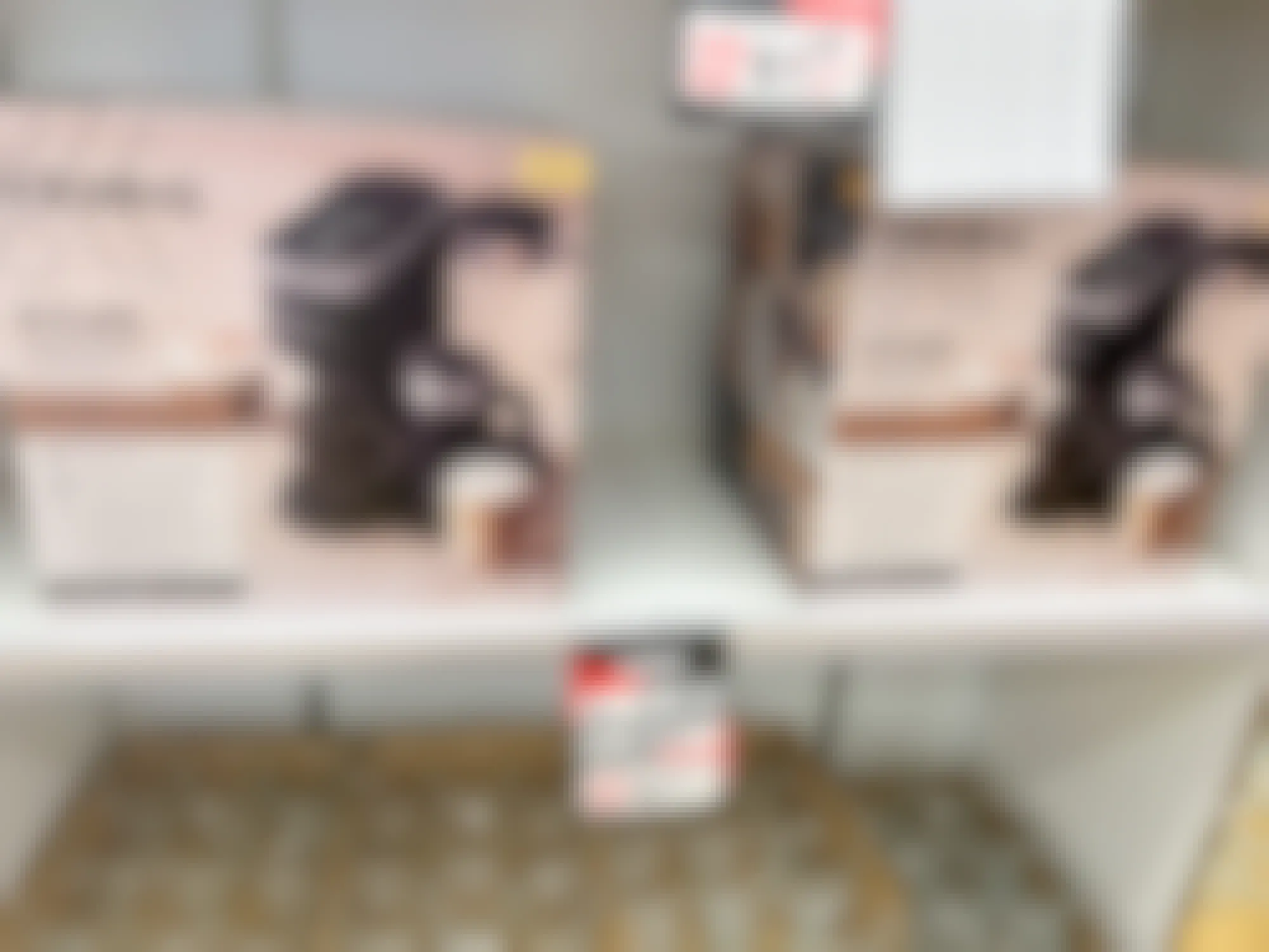 Keurig K Cafes on a shelf with a sale sign at Bed Bath and Beyond