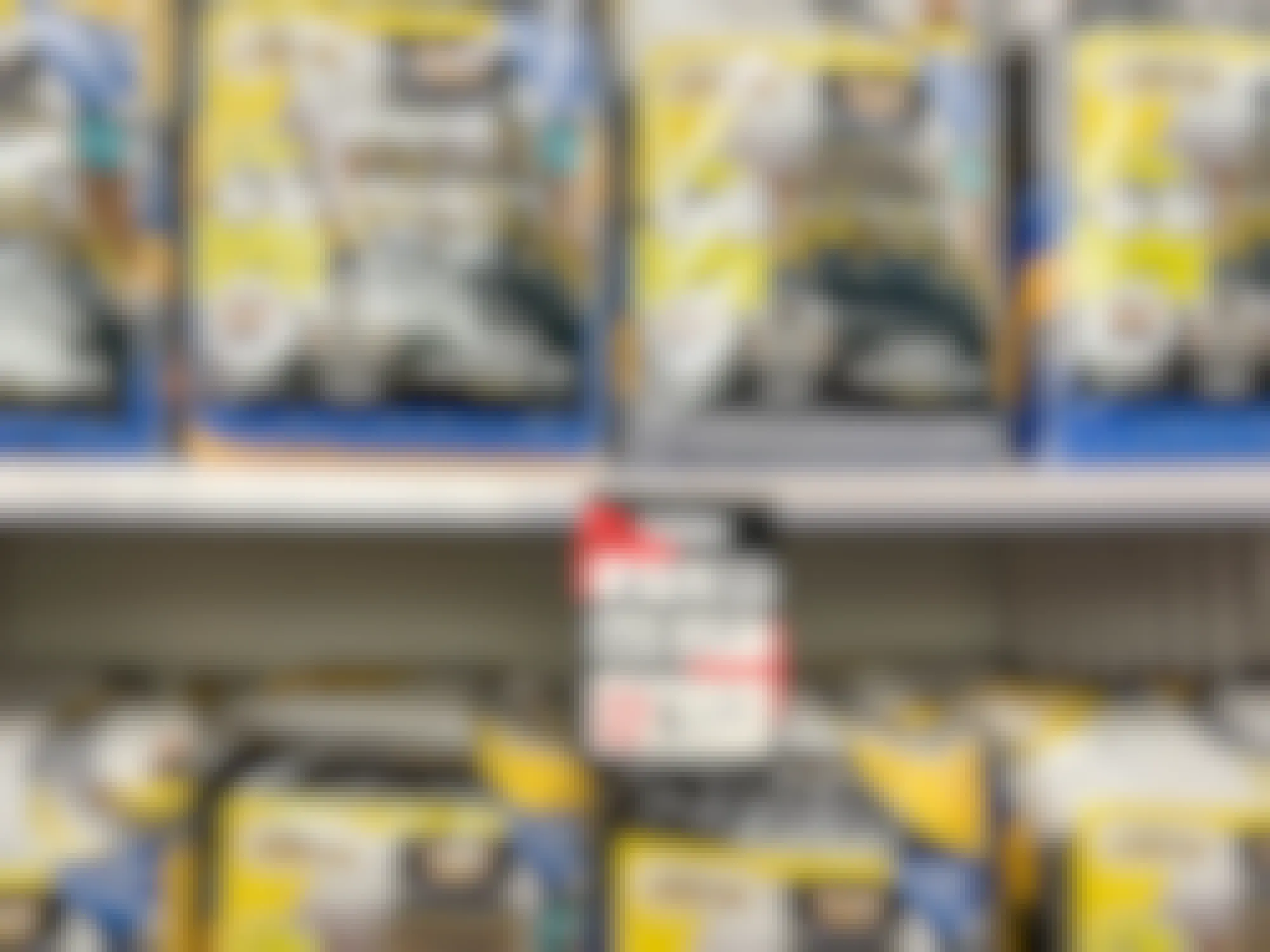 Minion bedding sets on a shelf with a sale sign at Bed Bath and Beyond