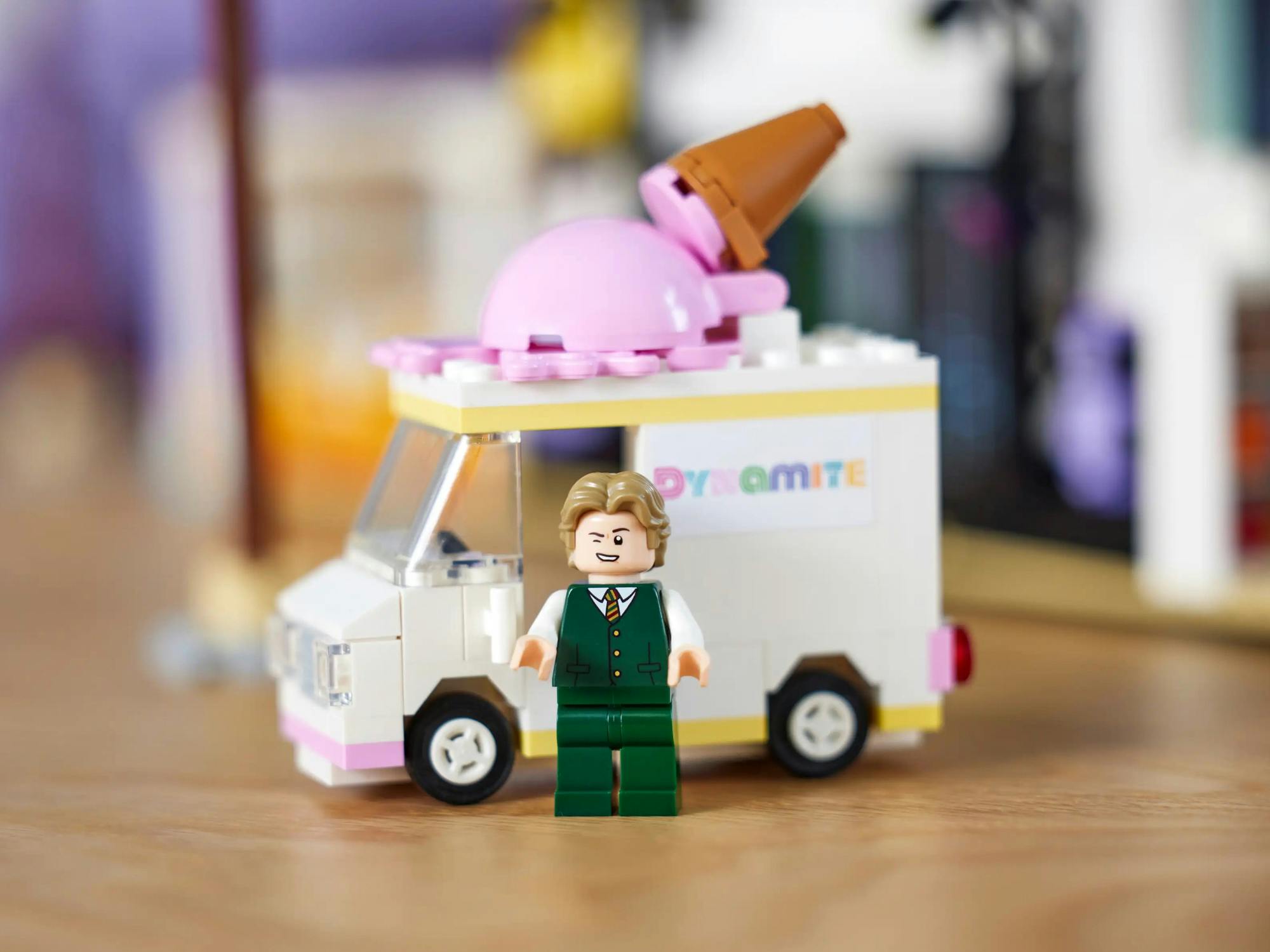 Part of the BTS Dynamite LEGO set with a band member and an ice cream truck