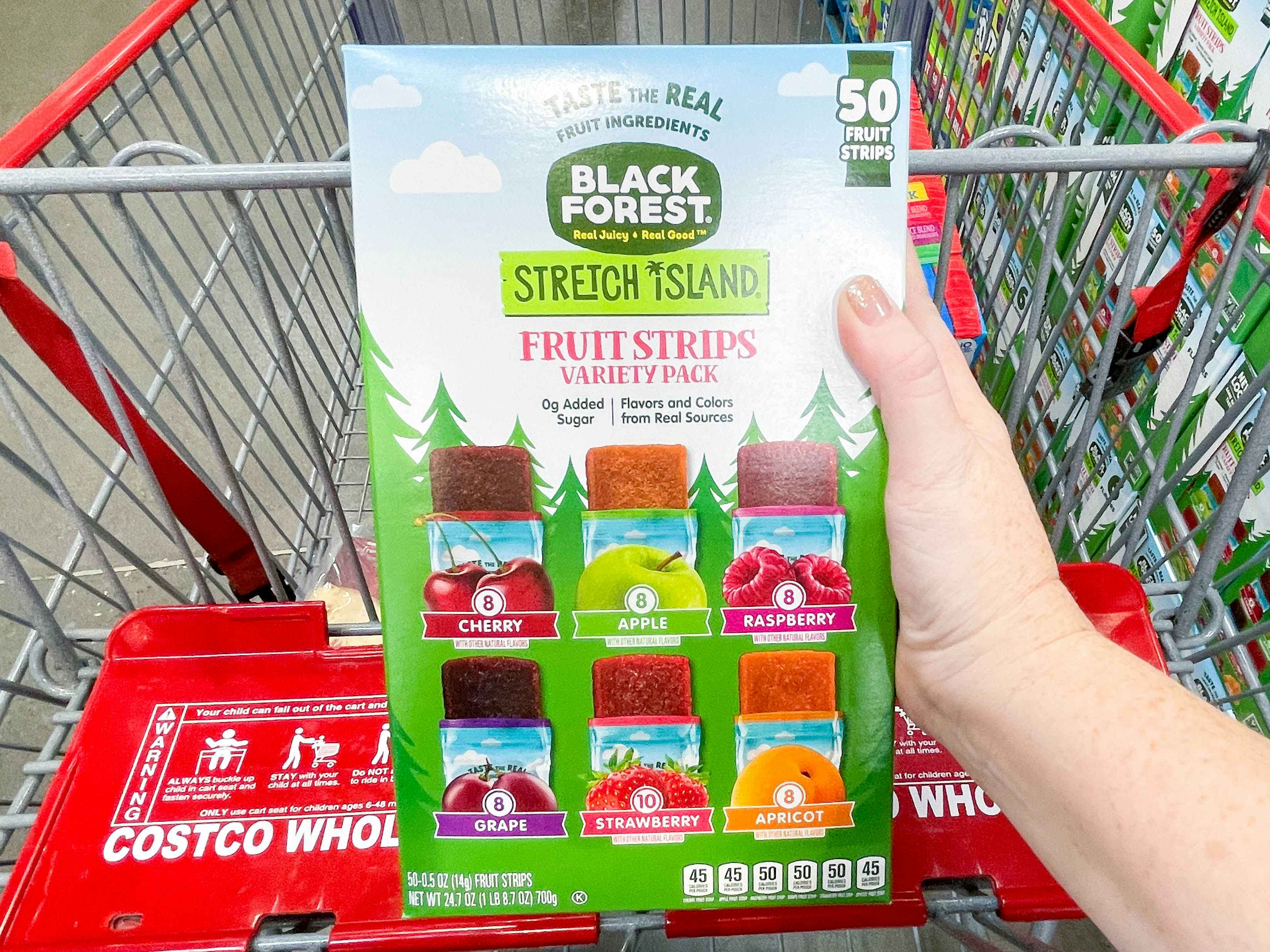a box of fruit strips being held in store