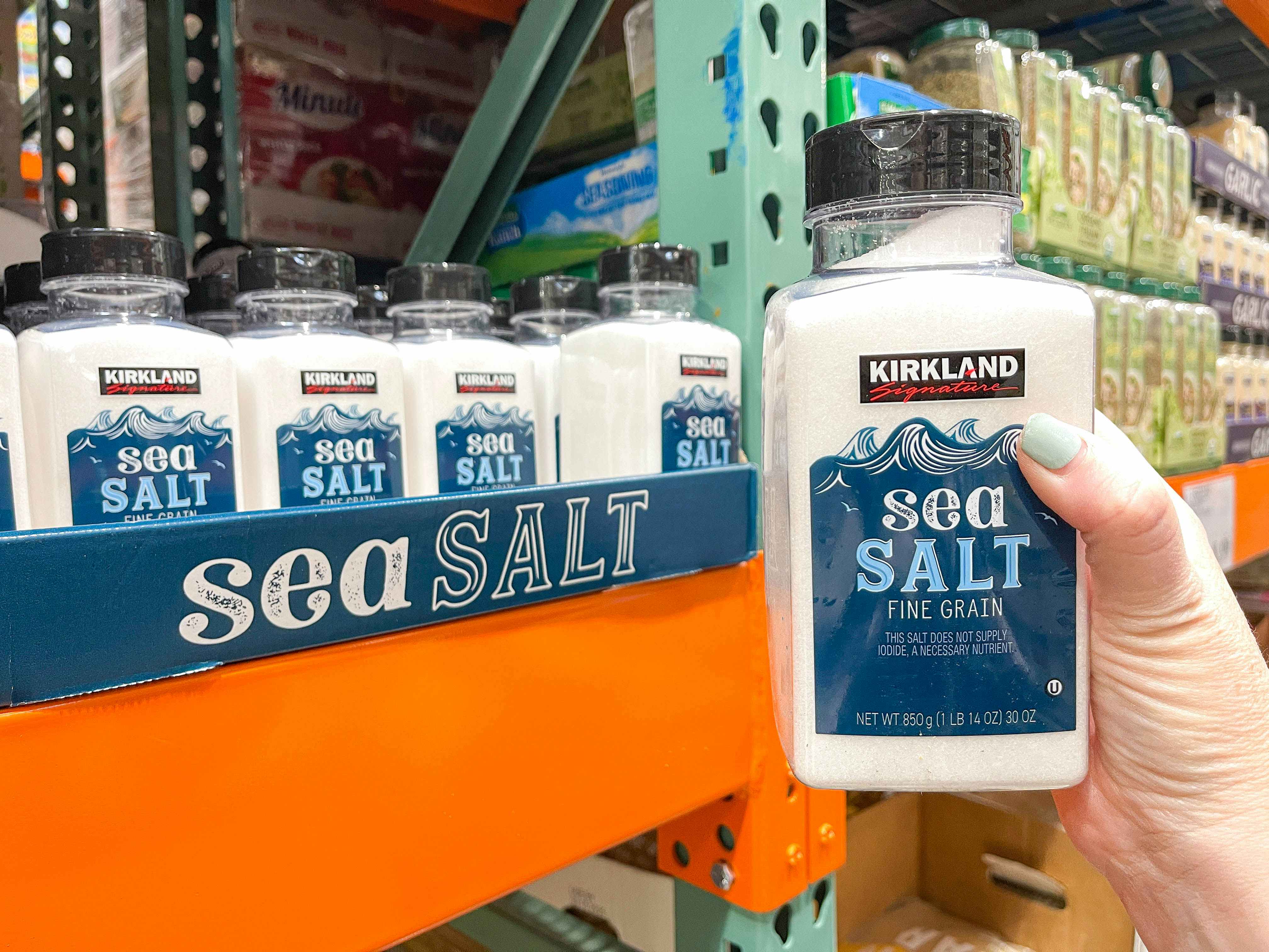 a person holding up sea salt