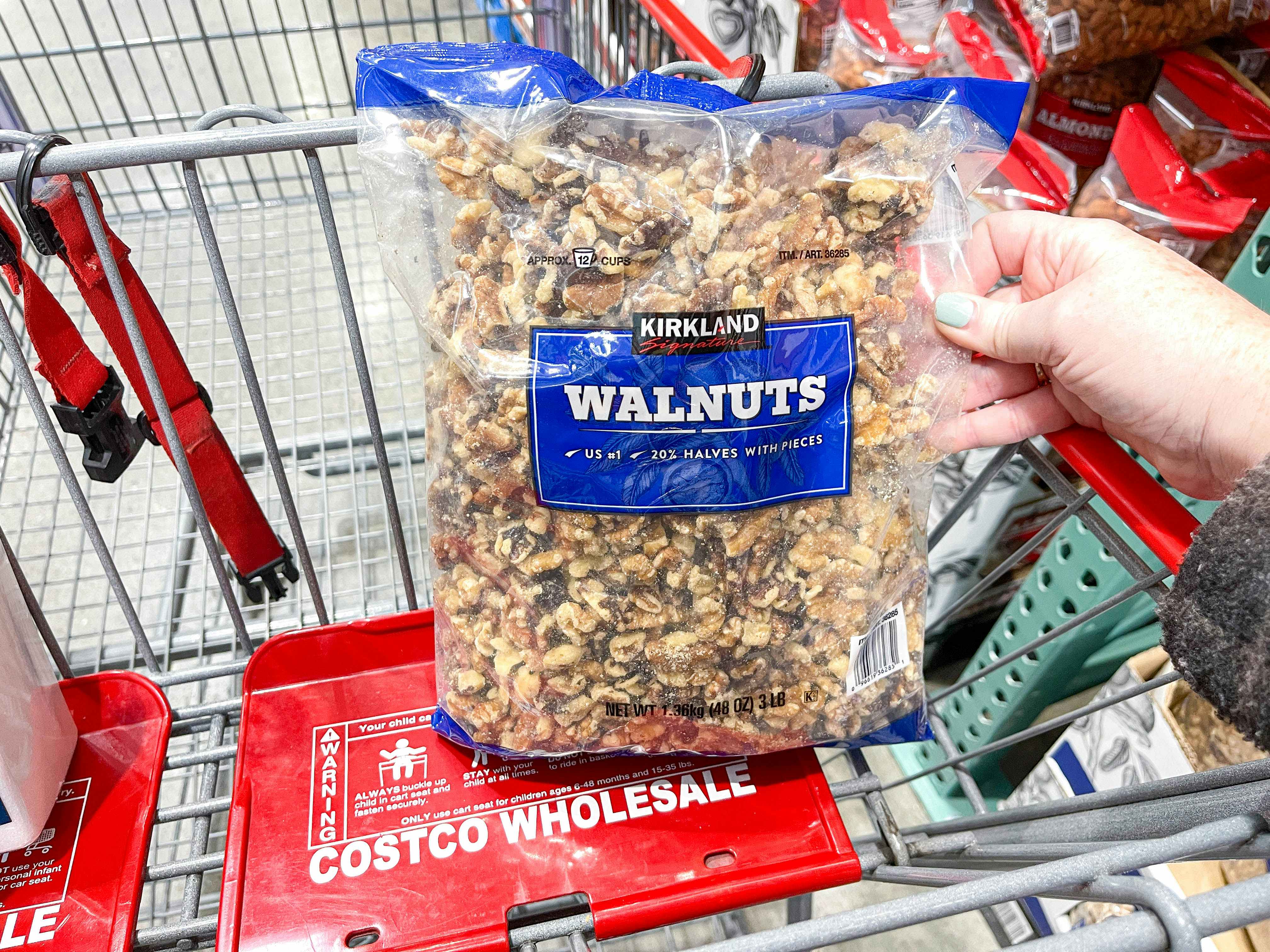 a walnut bag being put into a costco cart