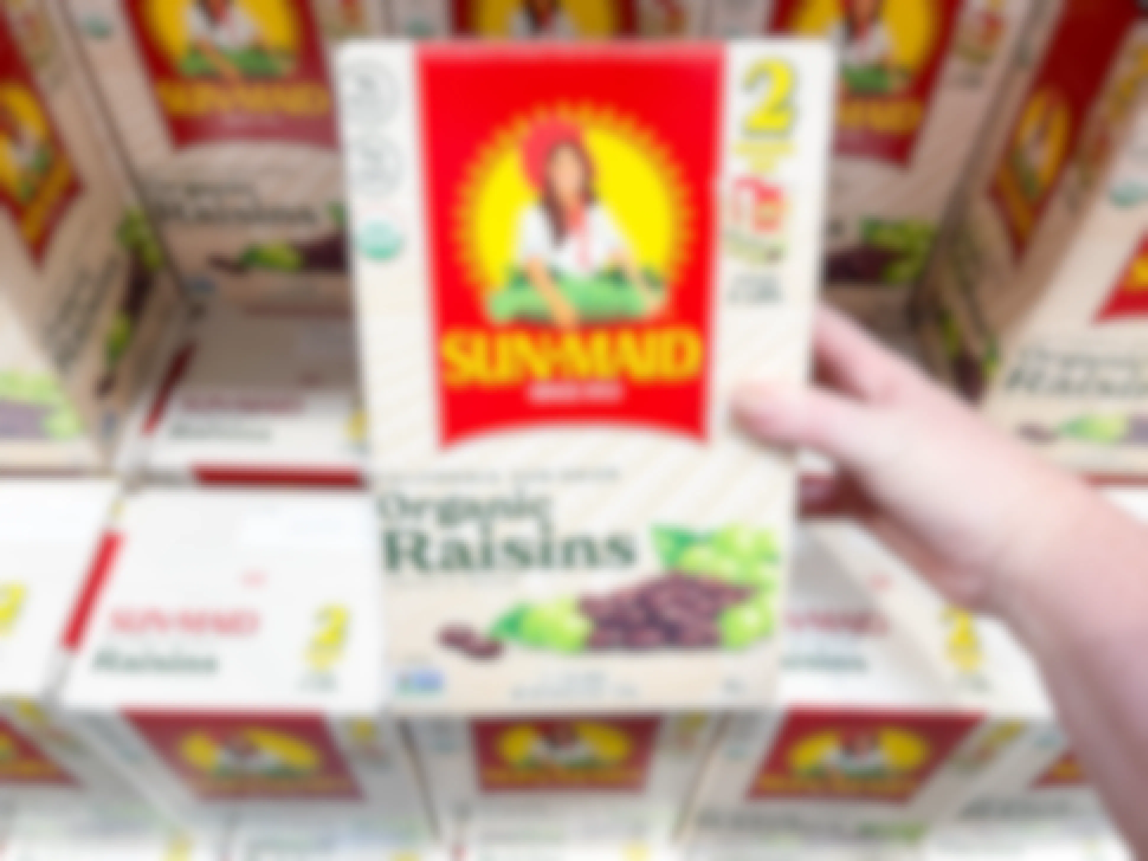 a box of raisins being held in store