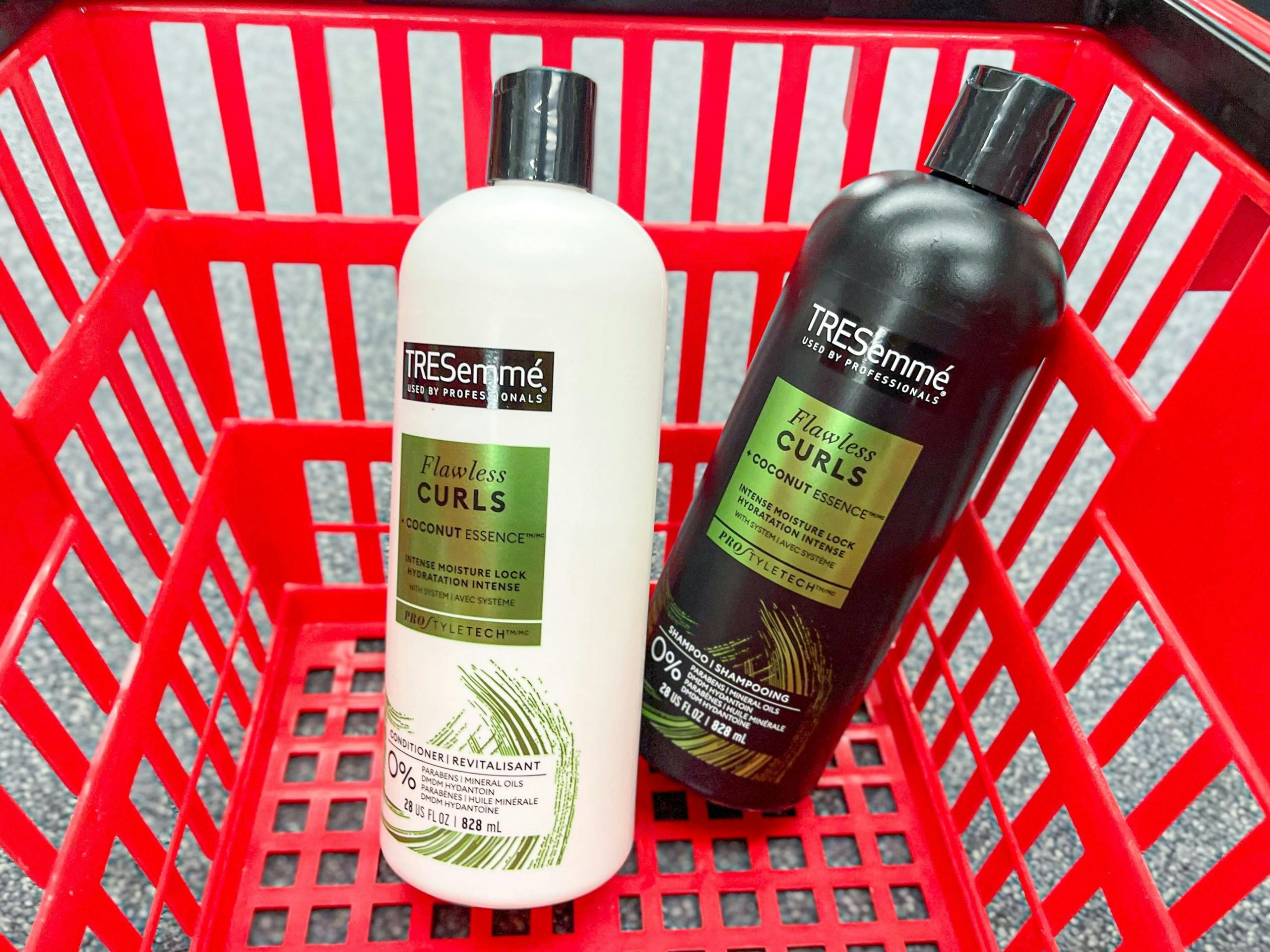 two bottles of Tresemme Flawless Curls shampoo and conditioner inside shopping basket