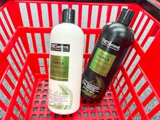 two bottles of Tresemme Flawless Curls shampoo and conditioner inside shopping basket