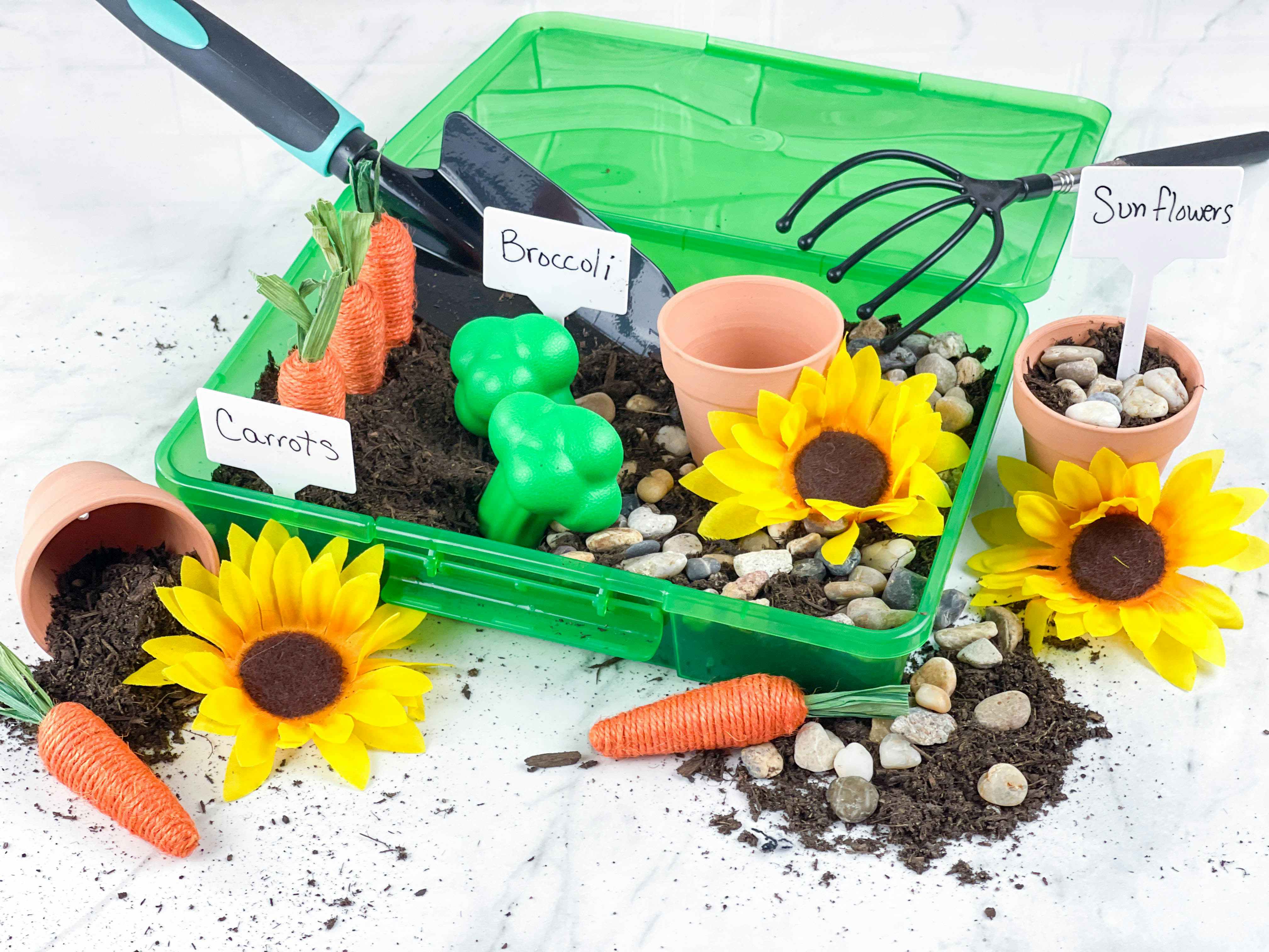 diy garden sensory bin sitting on a counter