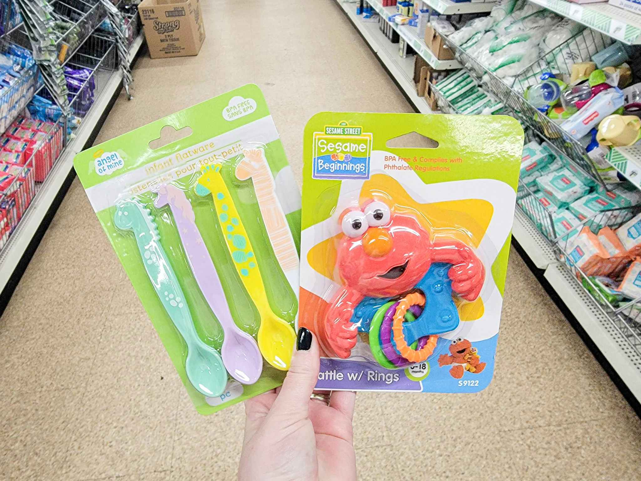 baby spoons and a rattle
