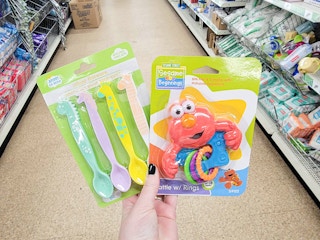 baby spoons and a rattle