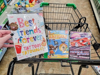 temporary tattoos in a cart