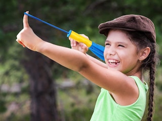 child shooting foam finger rocket