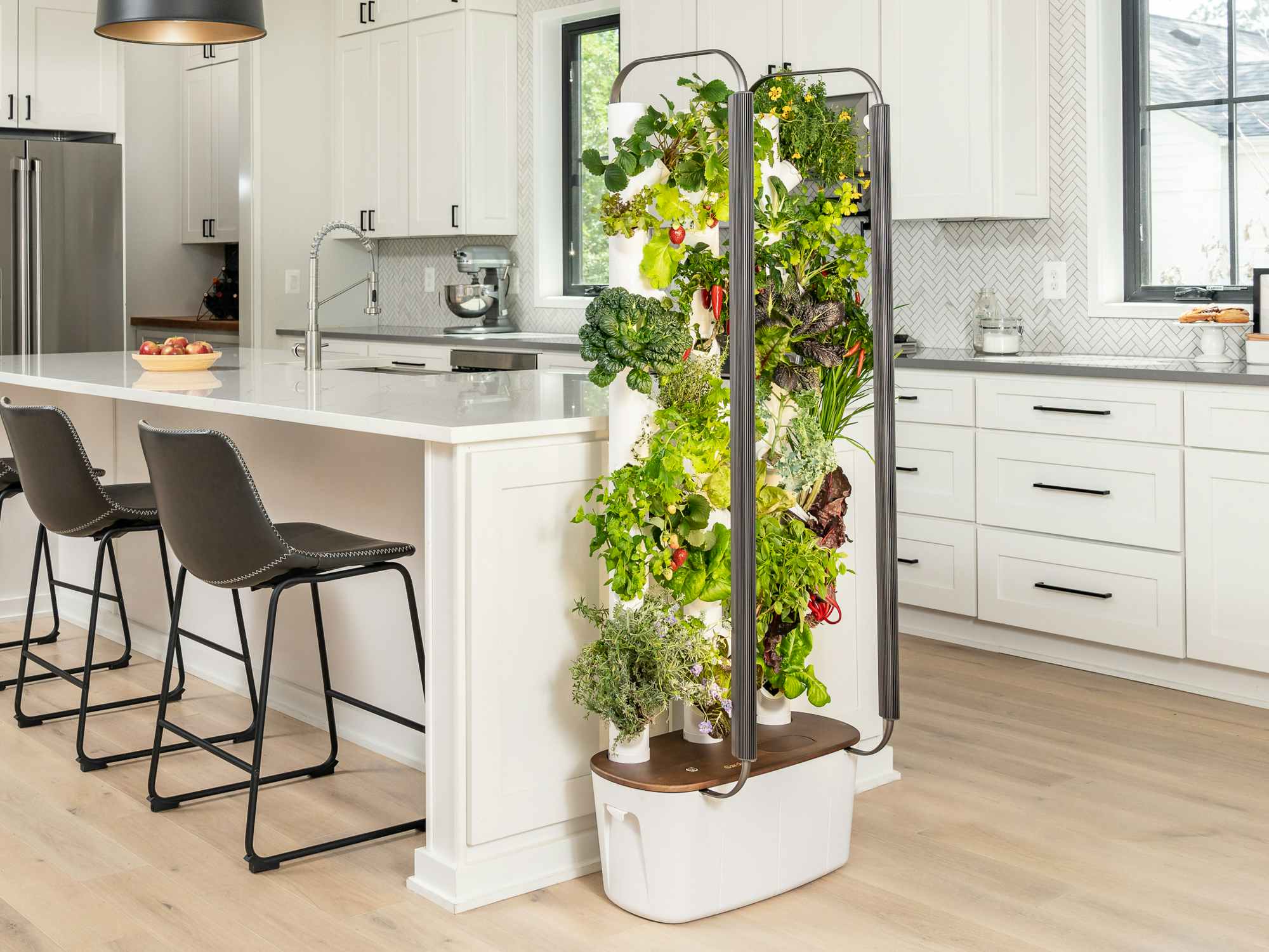 A Gardyn indoor vertical garden set up in a kitchen
