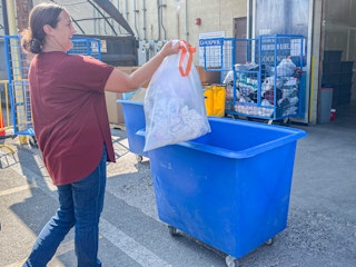 a person dropping off items to goodwill