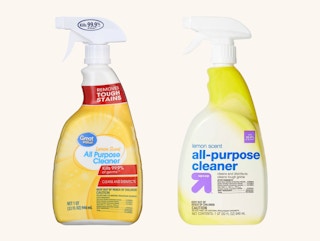 A spray bottle of great value all-purpose cleaner from Walmart next to a spray bottle of up & up all-purpose cleaner from target