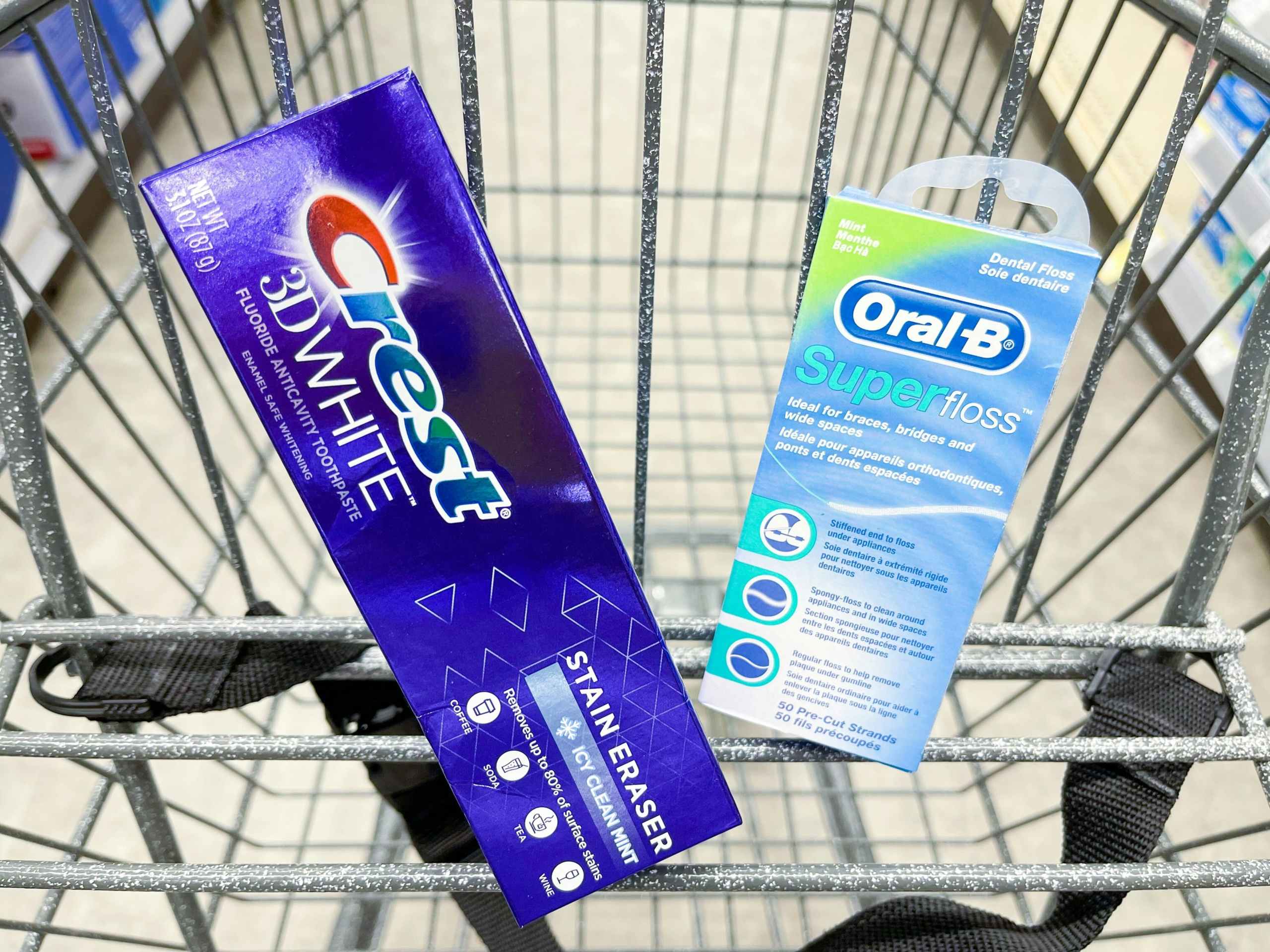 hand holding crest and oral-b products