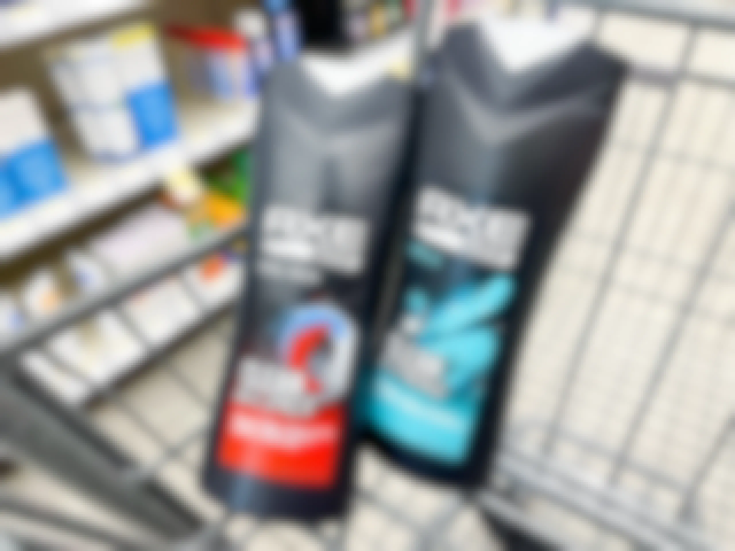 two bottles of axe body wash in shopping cart