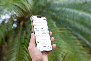 hand showing an iphone with instacart deals page opened