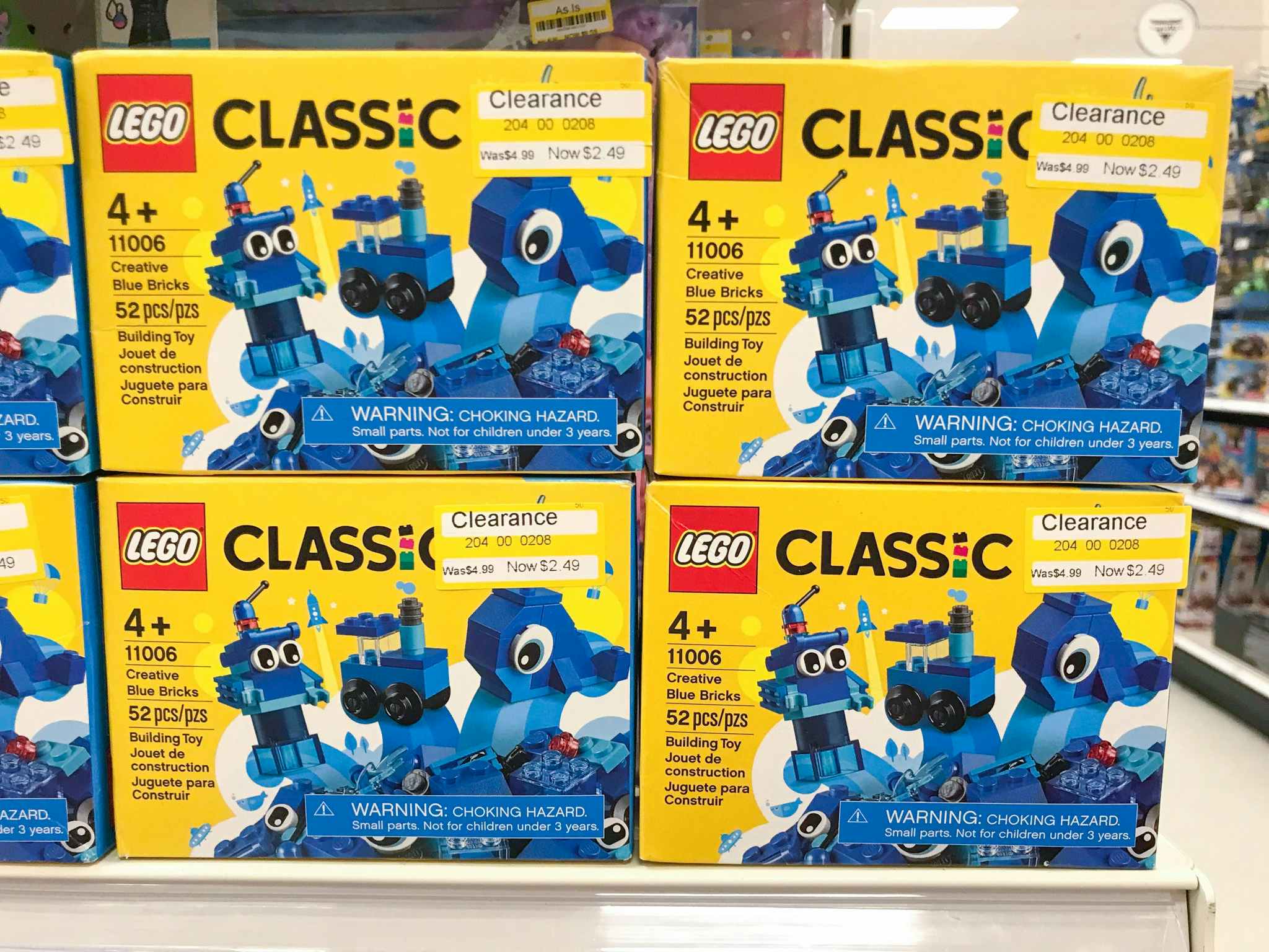 stacked boxes of LEGO sets at Target on shelf