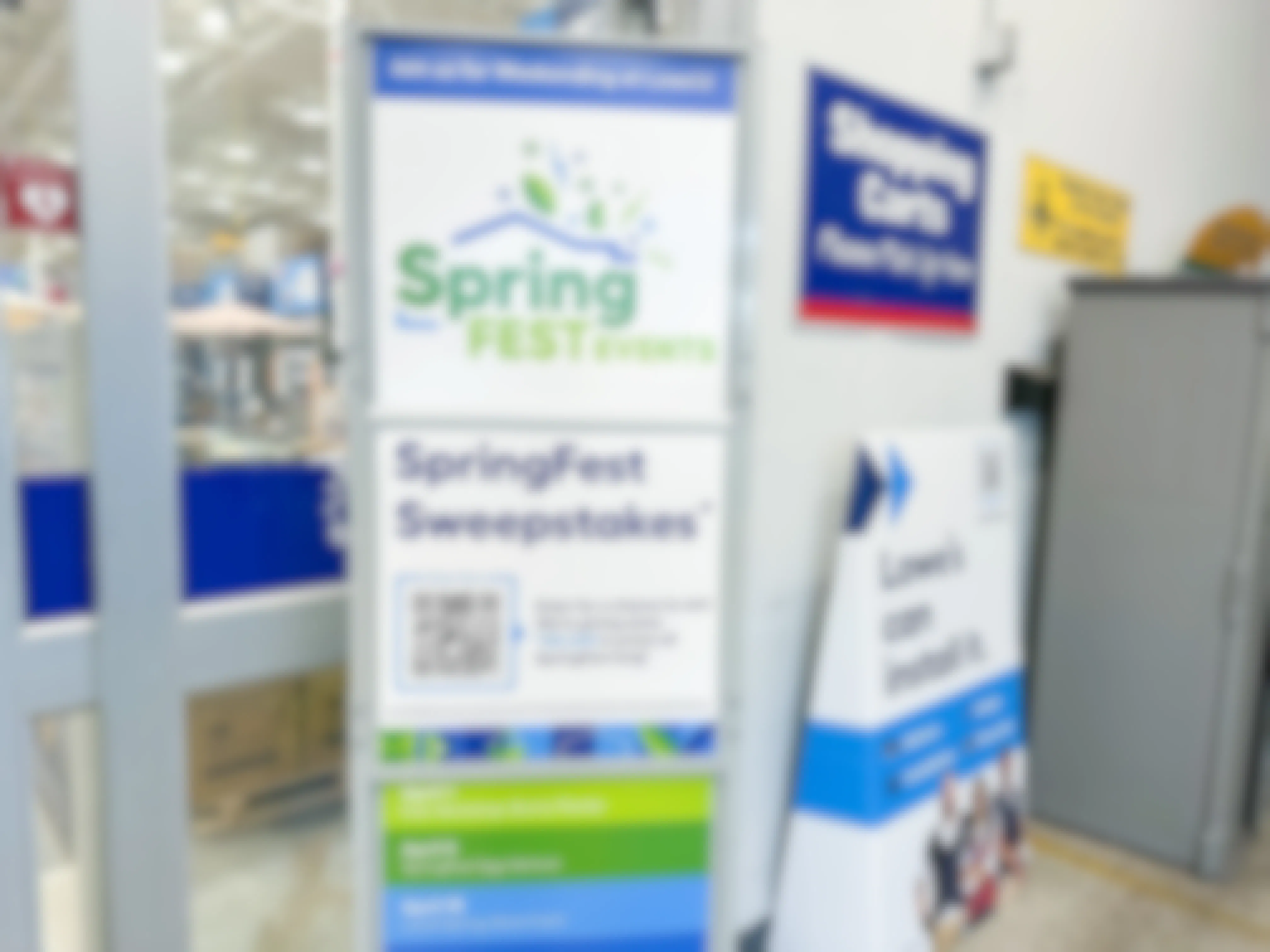 A Lowe's SpringFest 2023 sweepstakes sign in store at Lowe's
