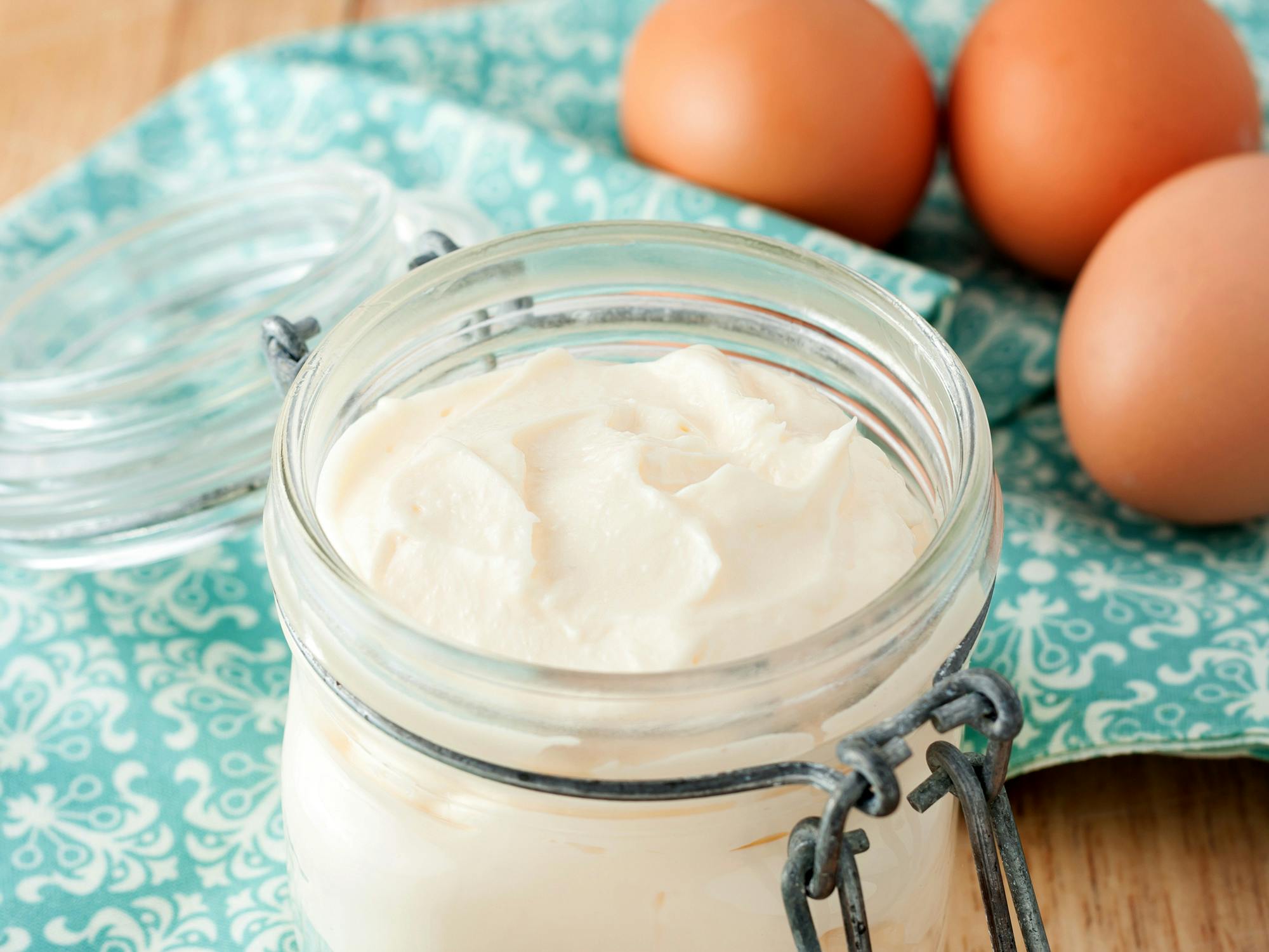 canning jar with homemade mayonnaise and eggs