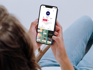 Someone looking at the Owalalife tiktok page on their phone