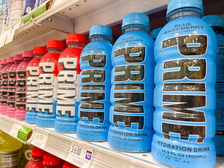 row of prime drinks on a shelf