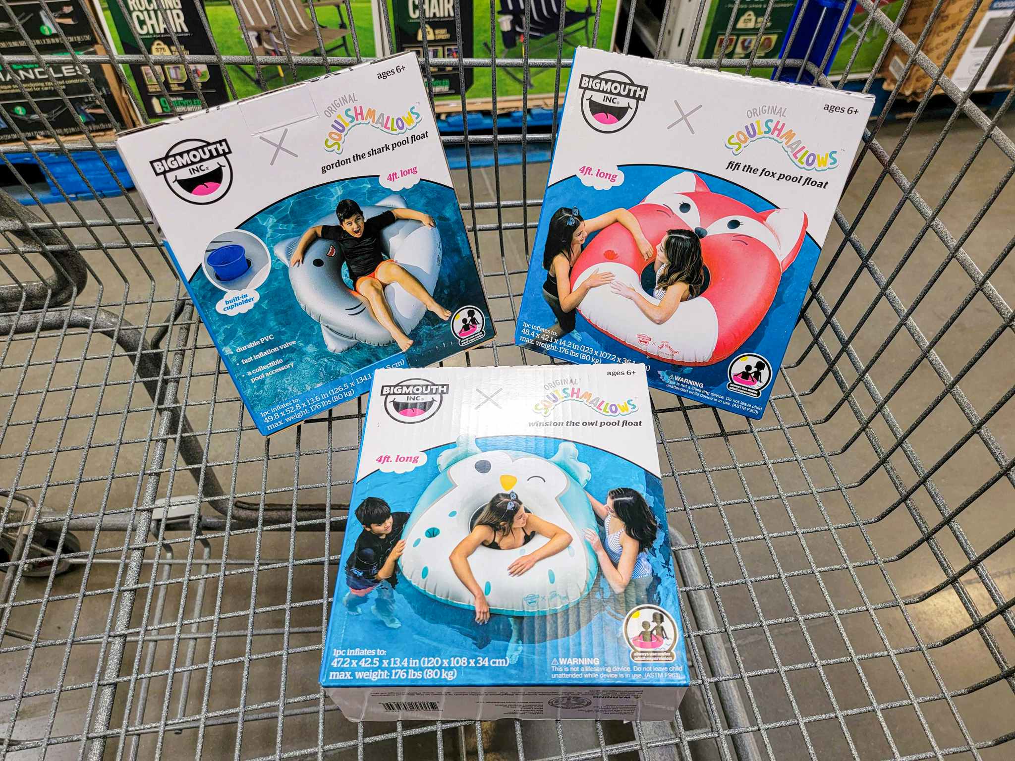 squishmallows pool floats in a cart