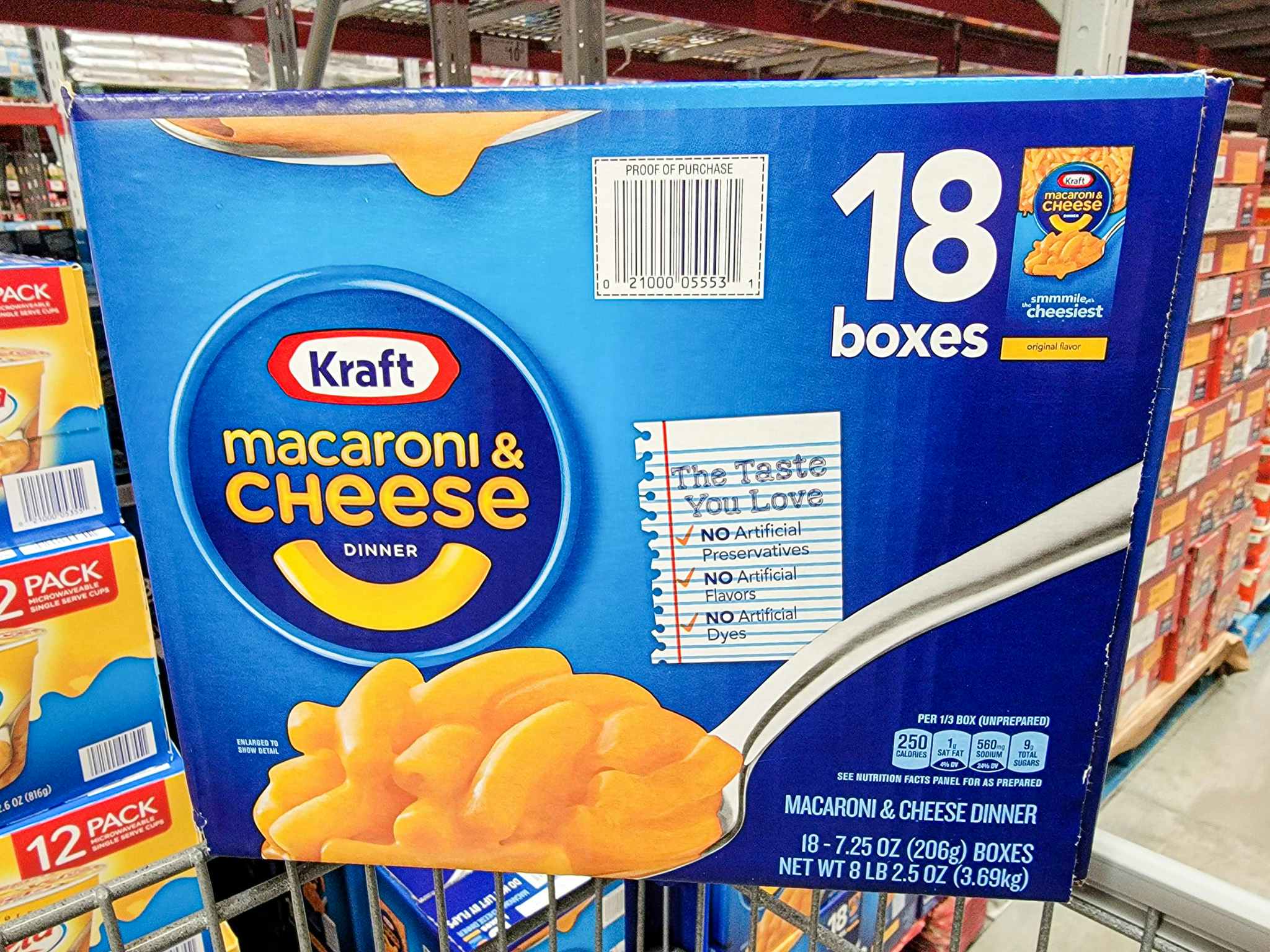 box of kraft mac and cheese 18-pack in cart at sams club