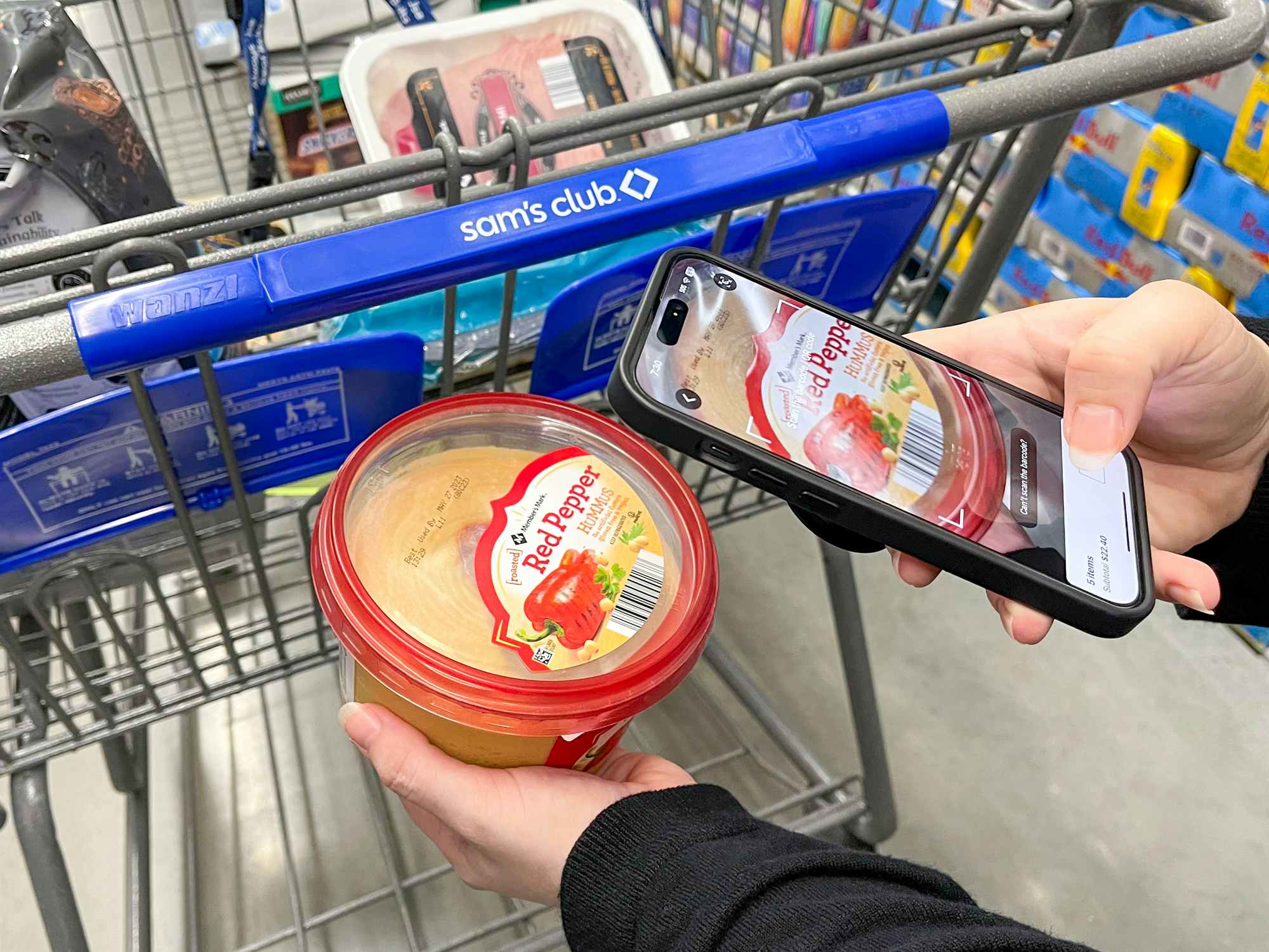 Someone scanning an item with the Sam's Club Scan and Go feature on the app
