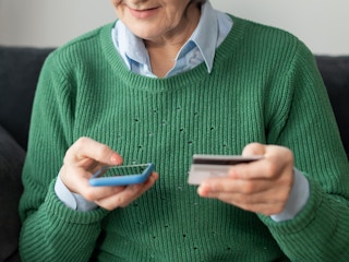 a person making a payment on their phone