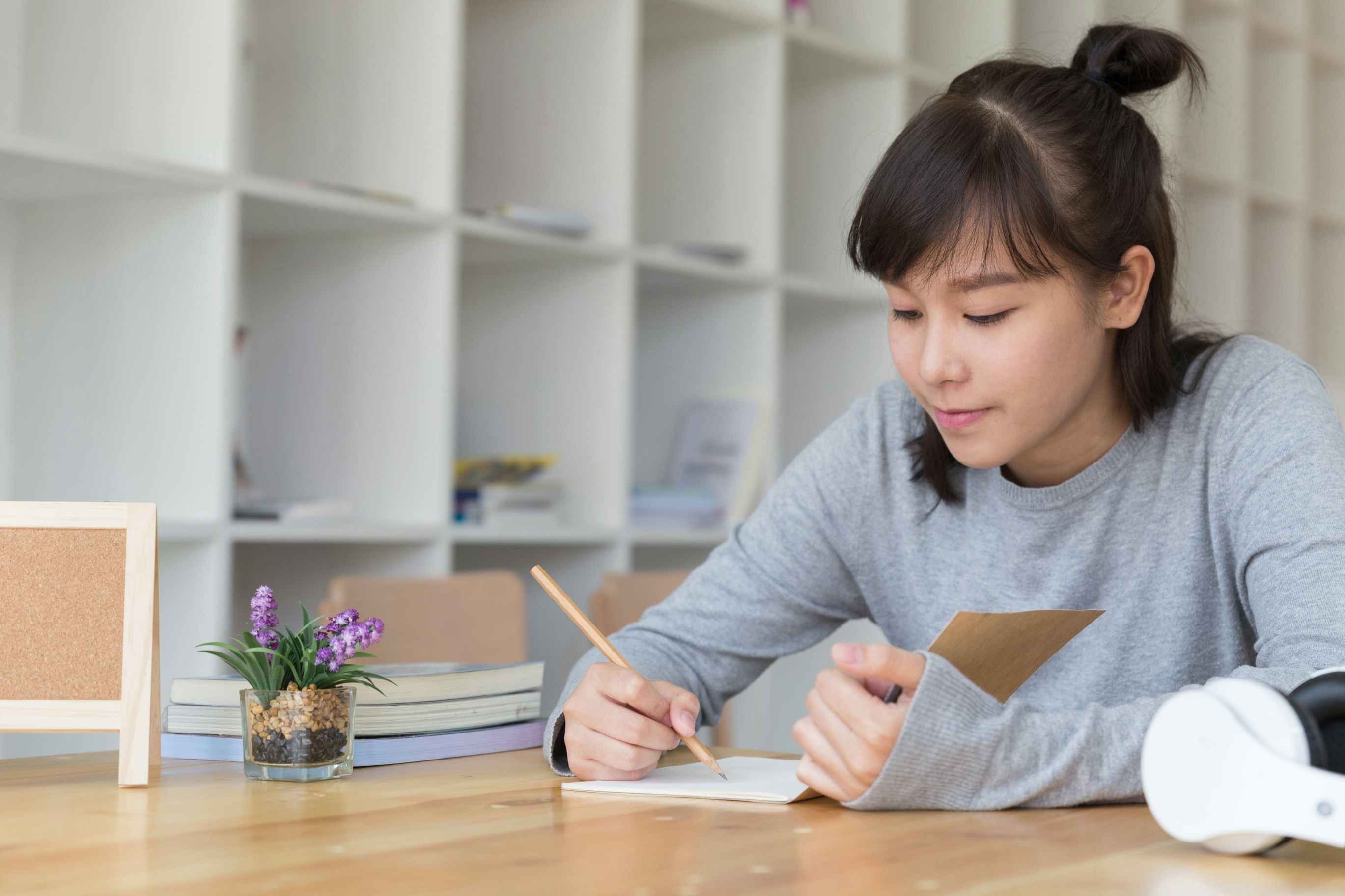 woman Wrtiing an essay