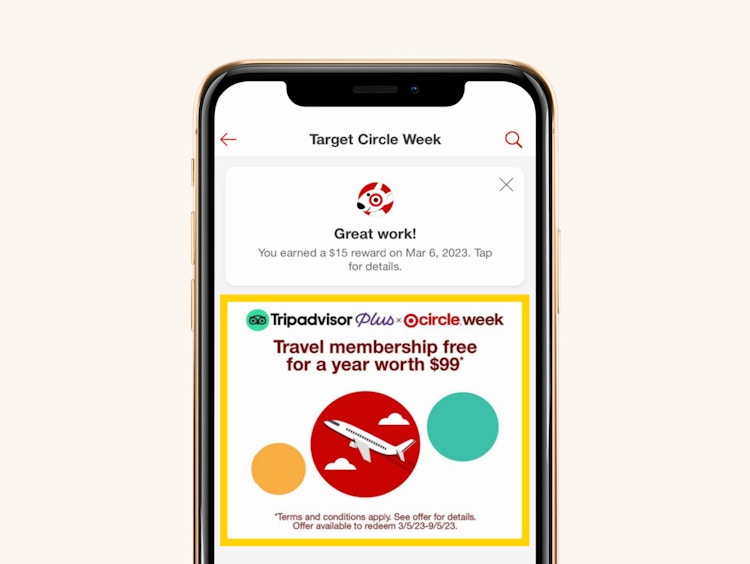 A smartphone showing the Target Circle Week offer for a free one-year membership to TripAdvisor Plus