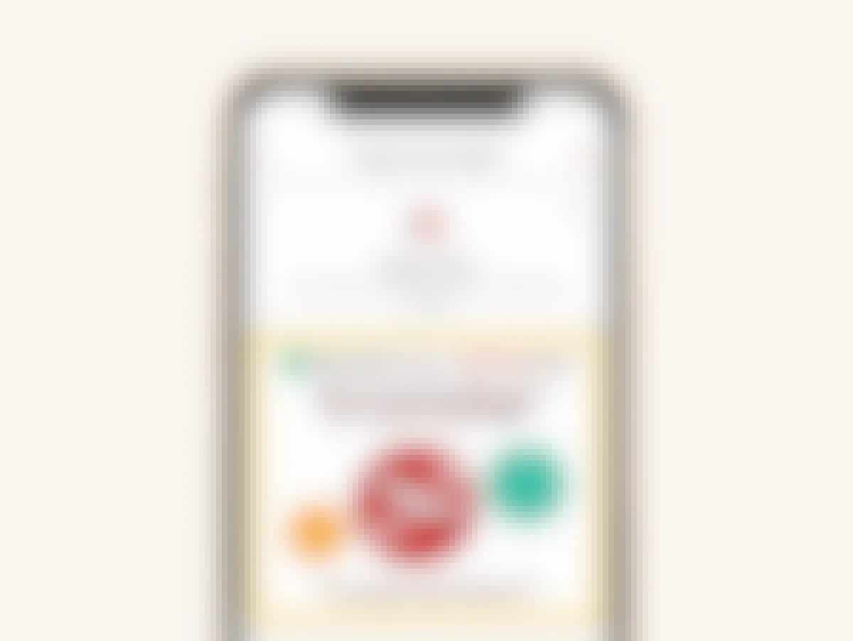 A smartphone showing the Target Circle Week offer for a free one-year membership to TripAdvisor Plus