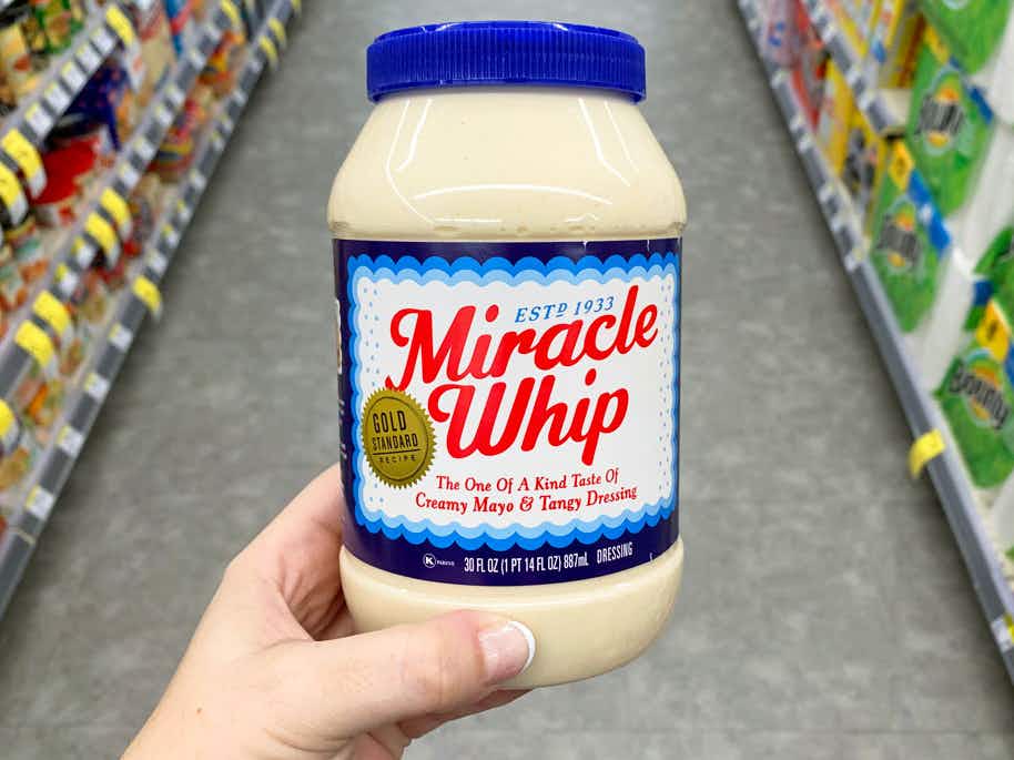 hand holding miracle whip product in store
