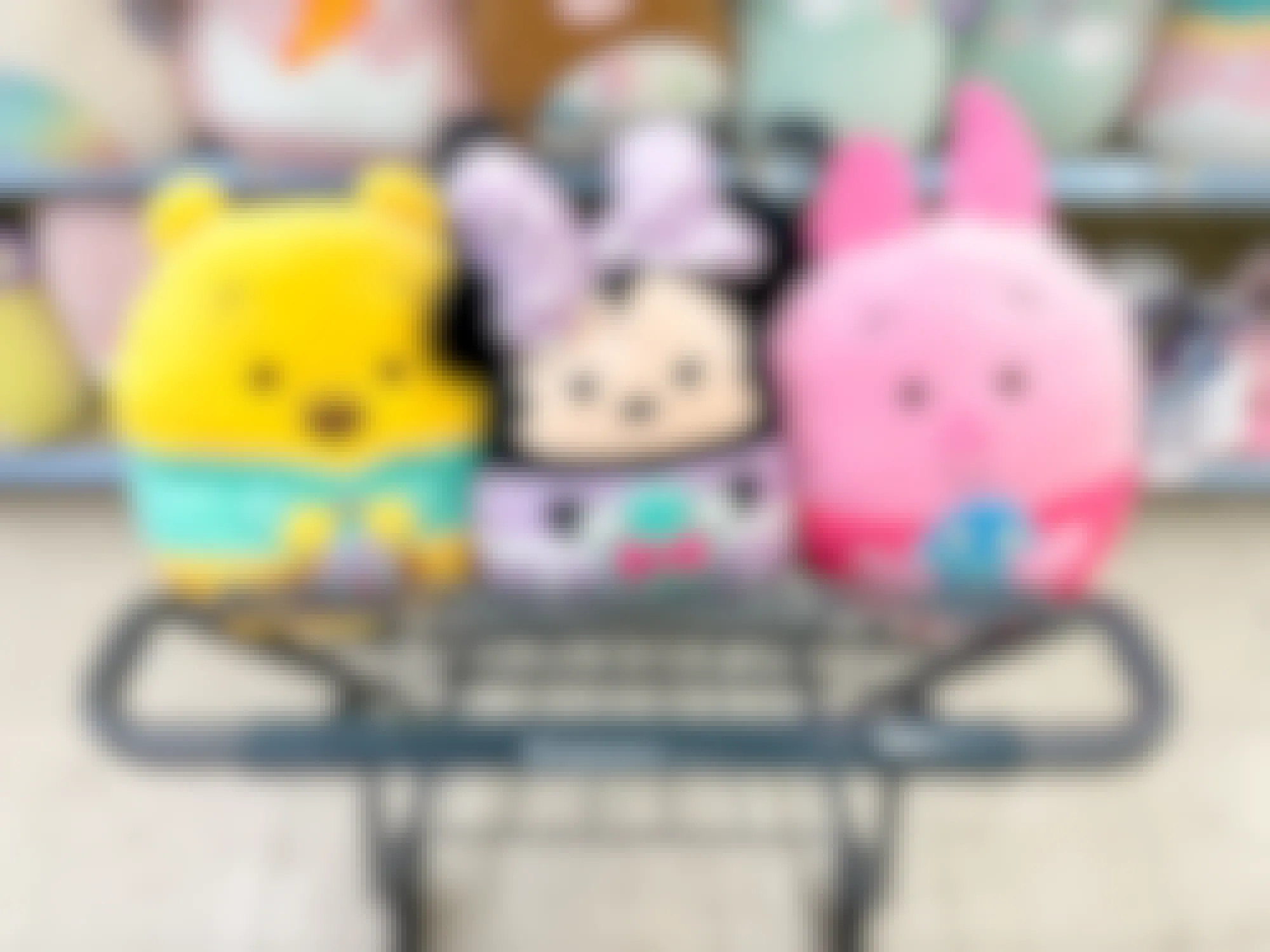 Some Disney Easter Squishmallows in a Walgreens cart