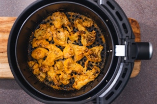 cooked cauliflower in an air fryer