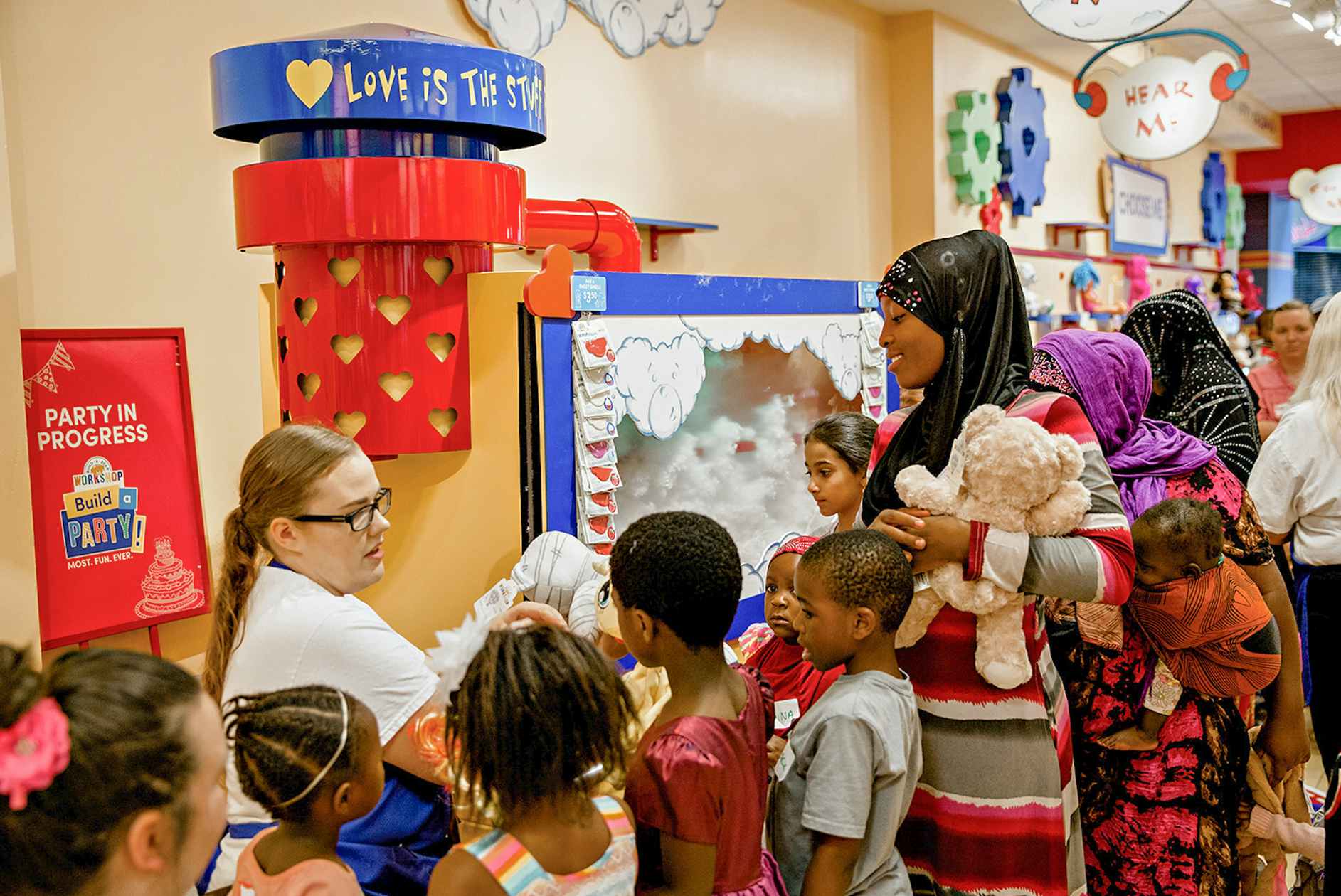 a party of kids at Build A Bear Workshop