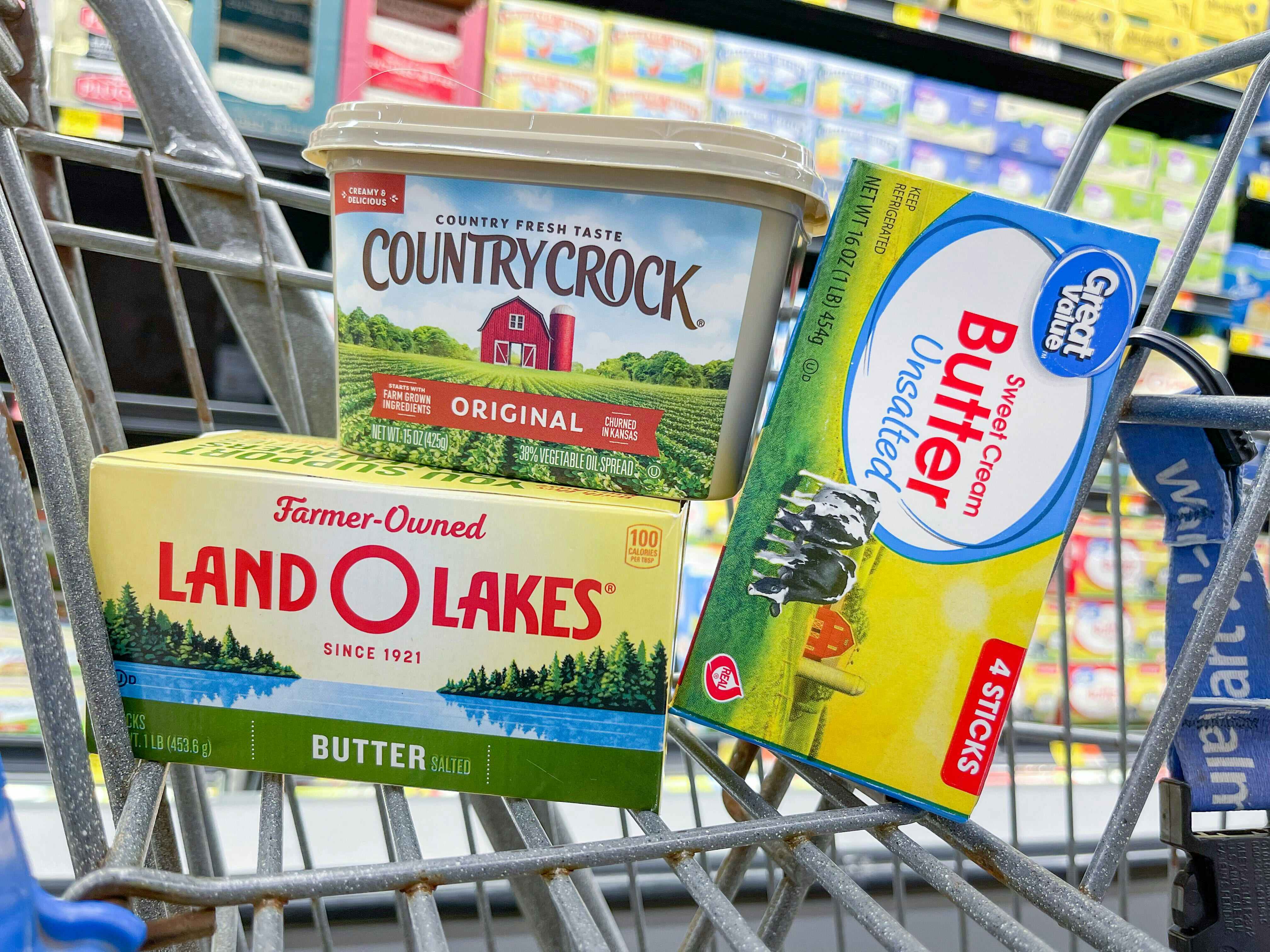Different brands of butter in a Walmart shopping cart