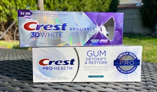 crest premium toothpaste on an outdoor table