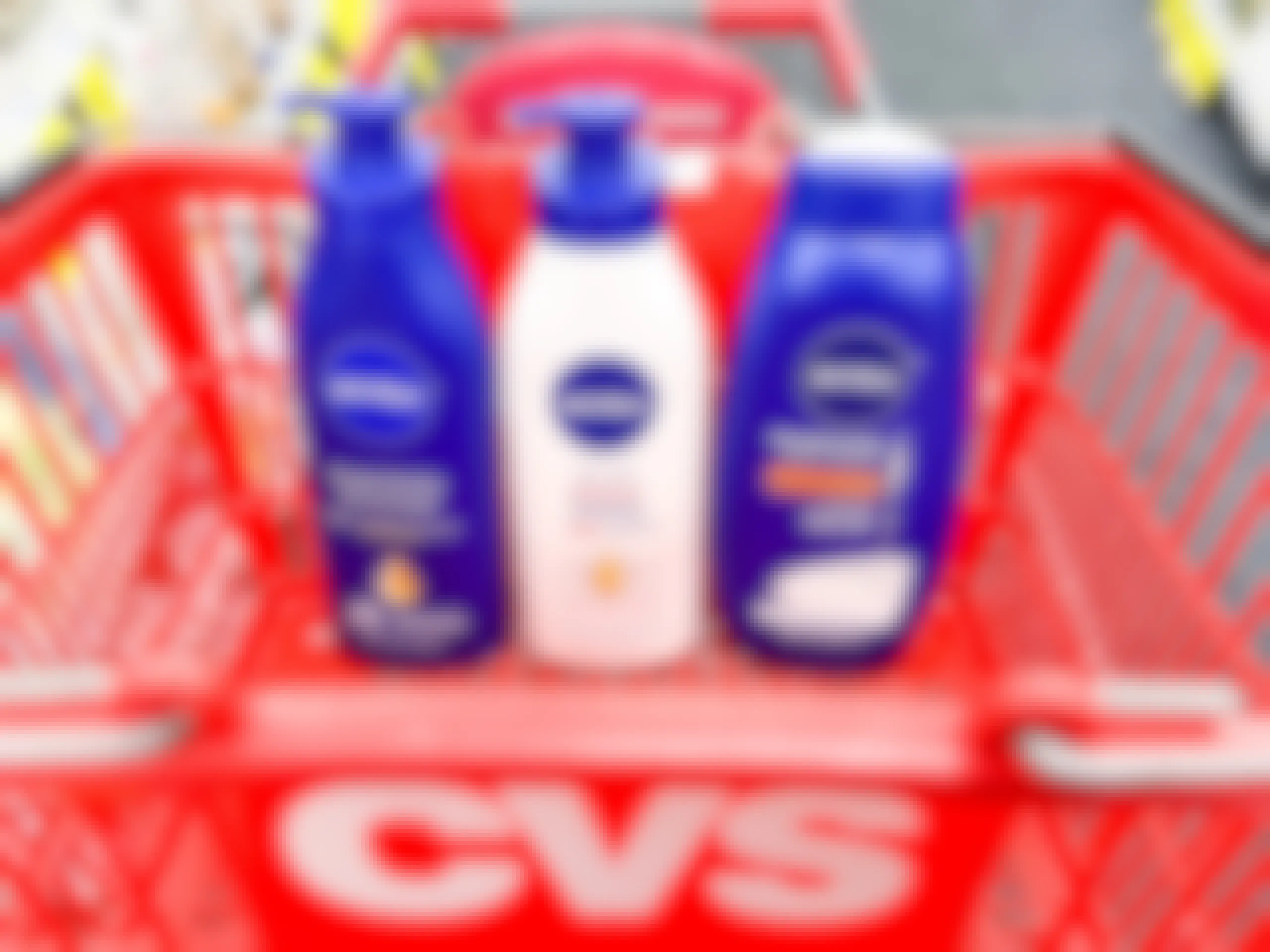 two bottles of Nivea body lotion and one bottle of body wash in shopping cart