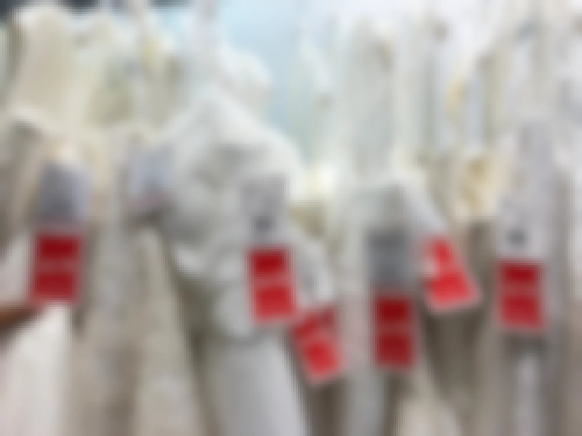 rack of wedding dresses marked down