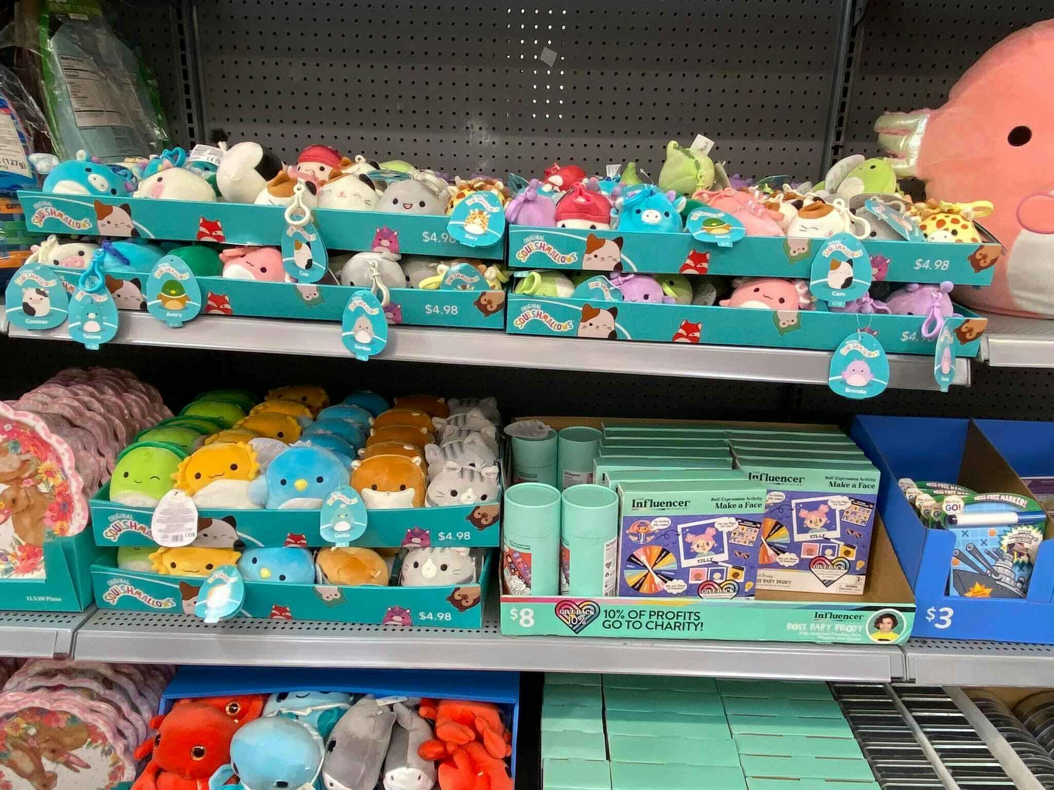 disney squishmallows keychains on display in walmart store aisle