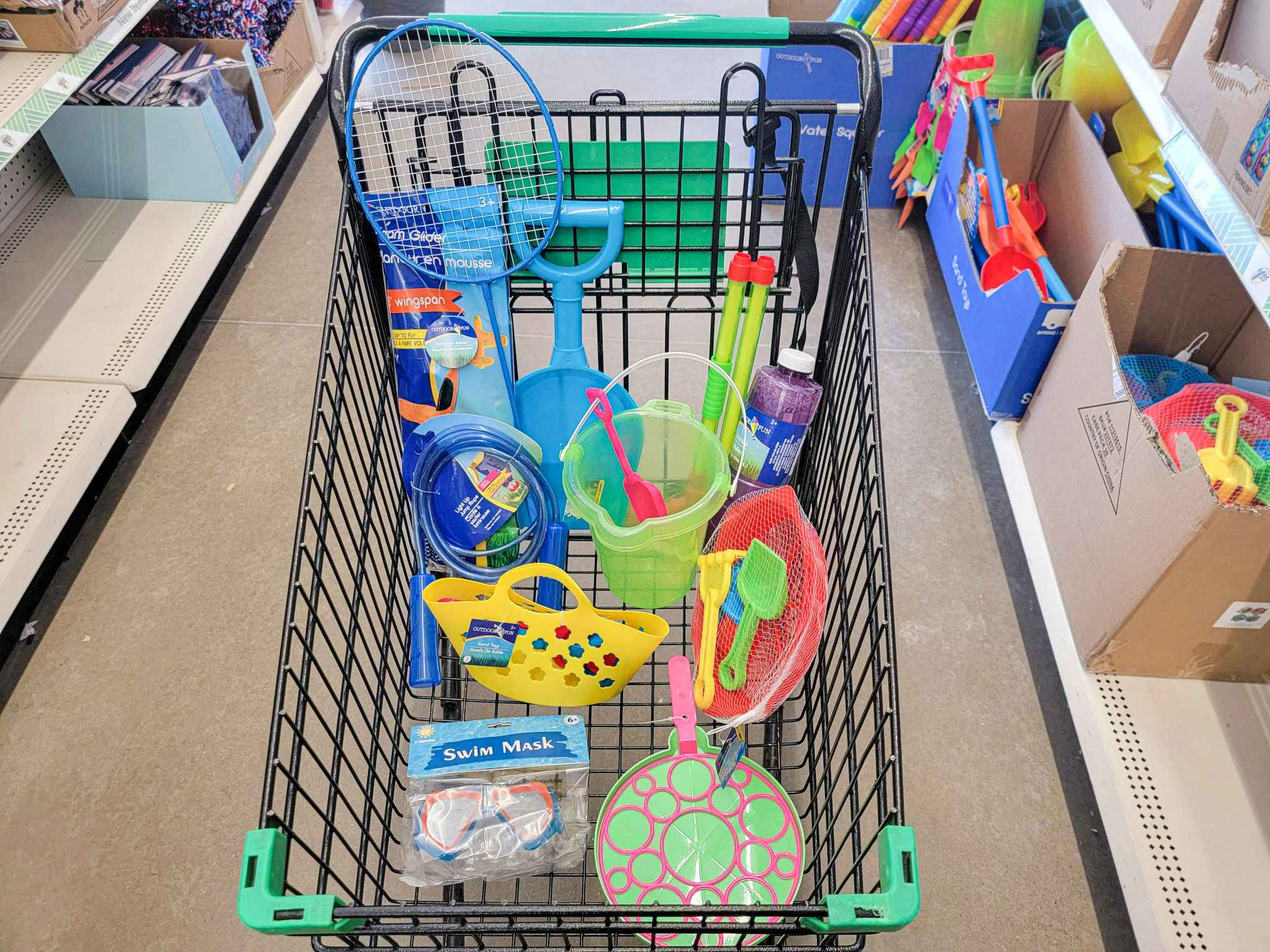 cart full of outdoor toys