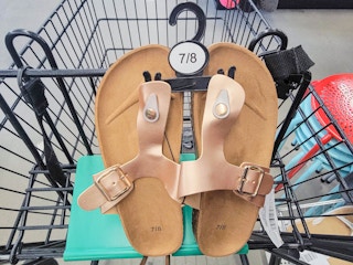 rose gold sandals in a cart