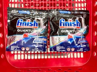 Two finish dishwasher packets in a target shopping cart