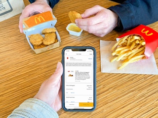 free mcdonalds six-piece chicken mcnuggets with screenshot of offer on iphone